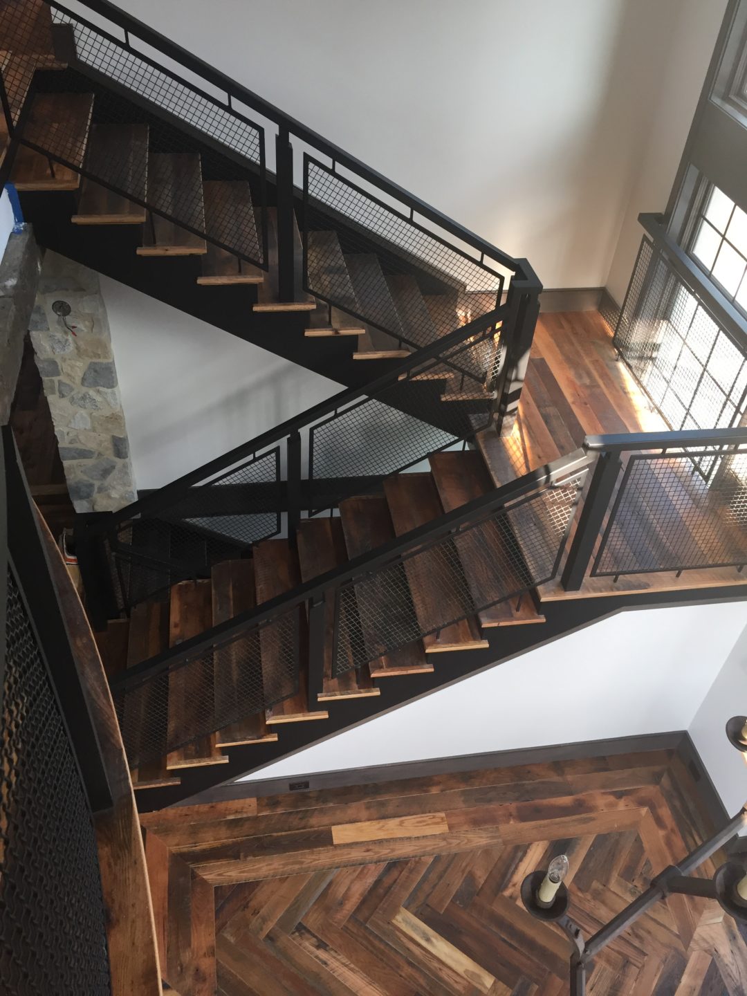 evergreen-portfolio-lakewood-french-country-tudor-interior-staircase-aerial